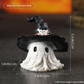 Resin wizard hat ornament in black and purple colours for seasonal decorations