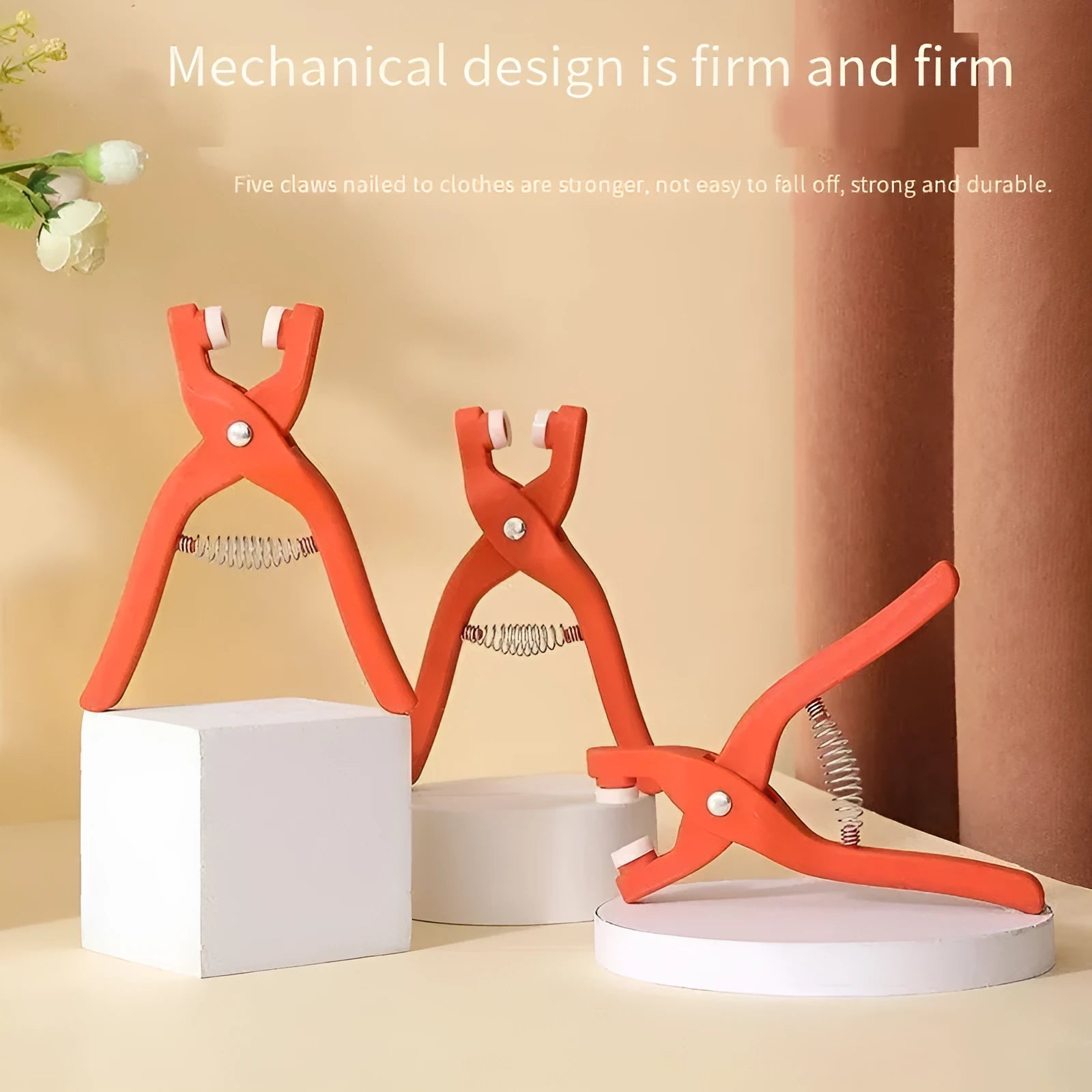 Stainless steel five claw no-sew buttons and pliers tool for children's clothing.