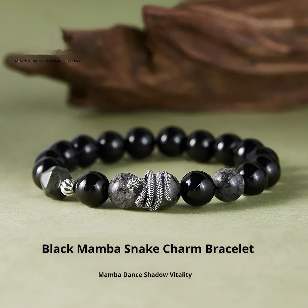 S925 sterling silver men's bracelet with black obsidian crystal and detailed snake design on a wrist.