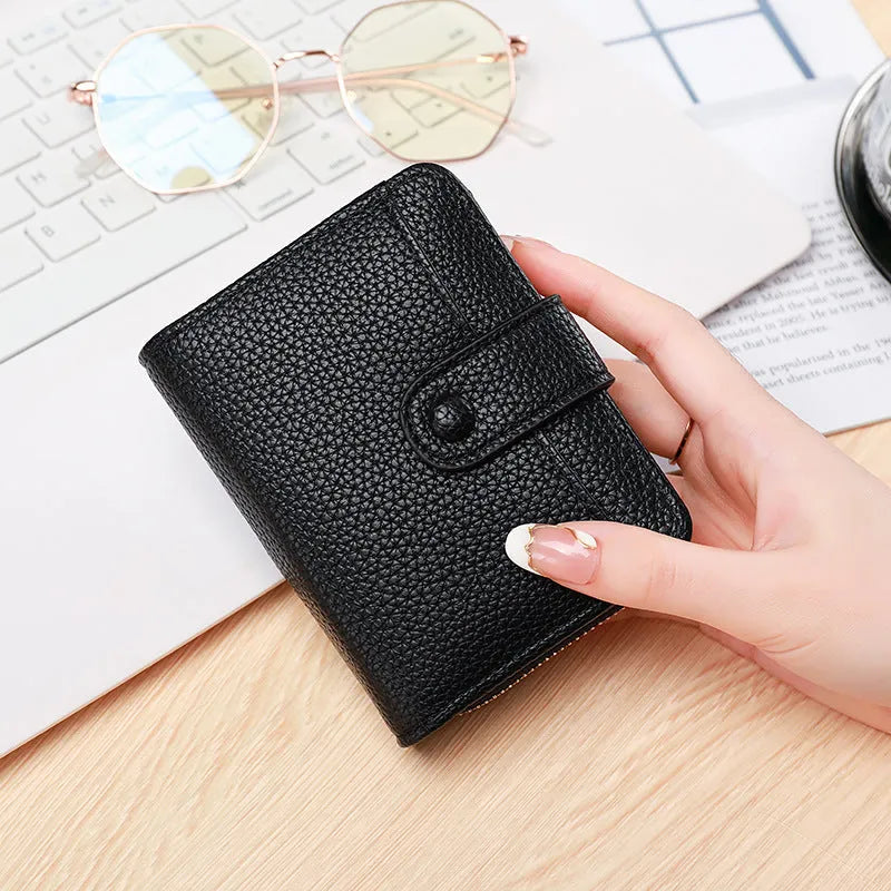 Beige ladies short wallet with lychee pattern, showing 2-fold PU construction.
