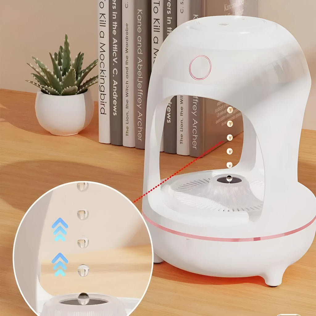 Levitation humidifier with floating water drops and LED night light in columnar design