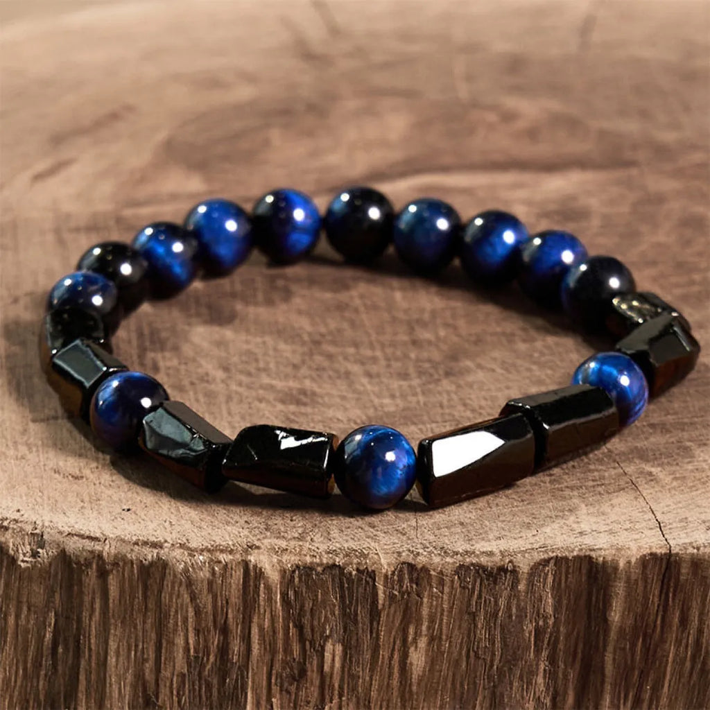 Single strand bracelet with 8mm round beads in natural obsidian, malachite or tiger eye stones.