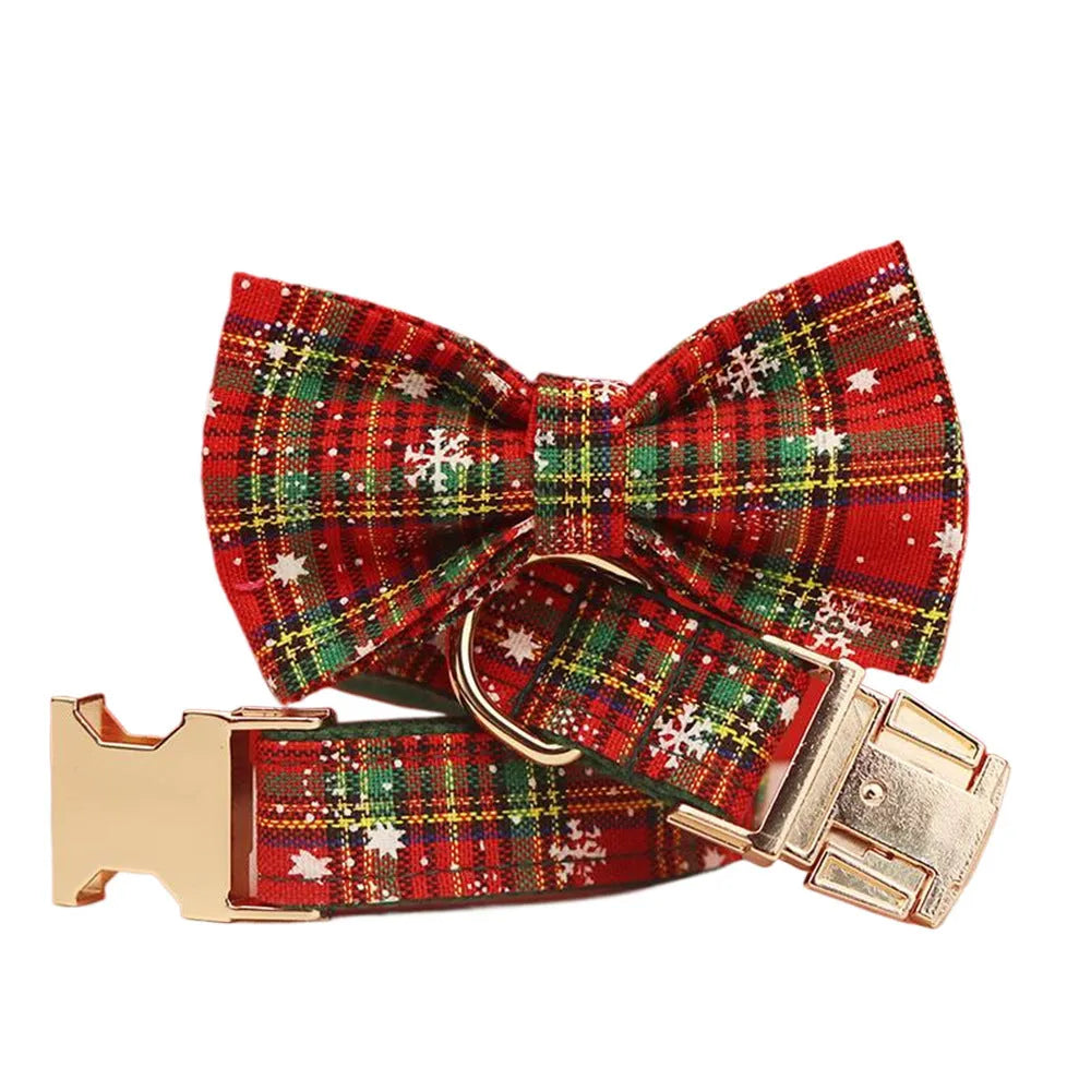 Green snowflake print dog collar set with matching leash, vest, and bow for Christmas