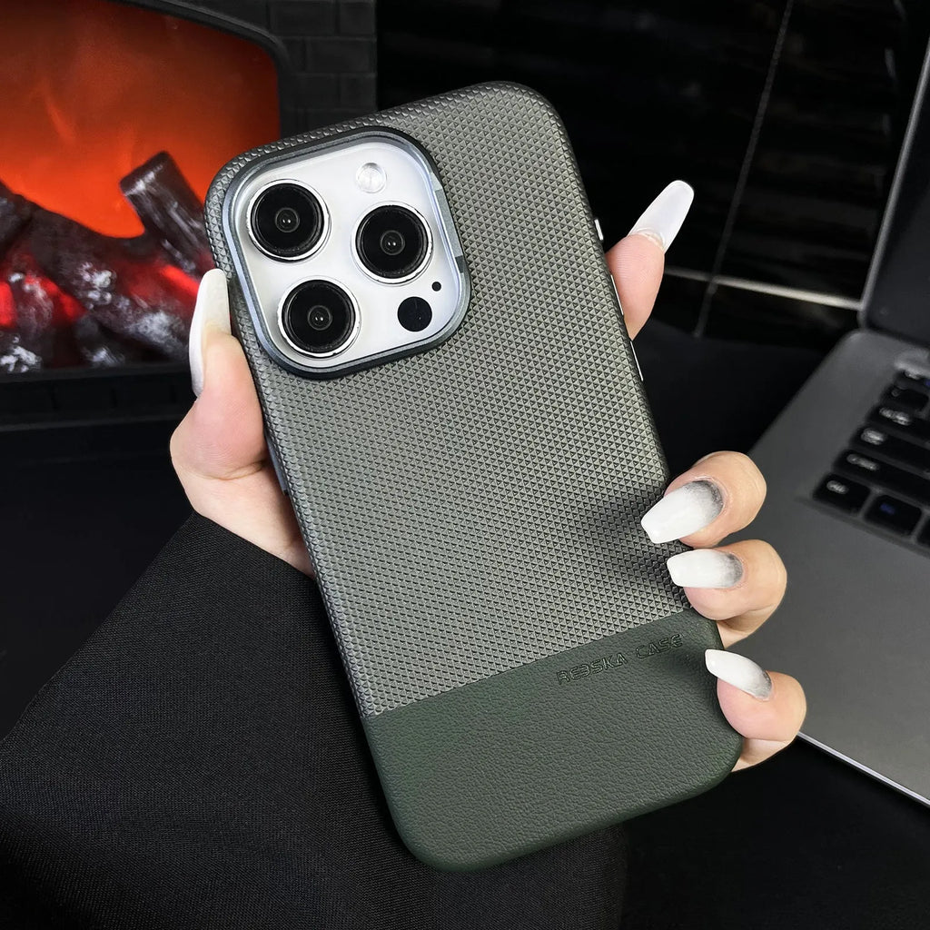 Black magnetic iPhone case with dragon scale texture and stitching, shown on an iPhone 15 Pro.