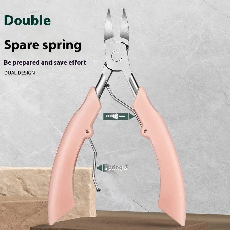 Coloured nail clippers with a visible angled bevel groove on the cutting head.