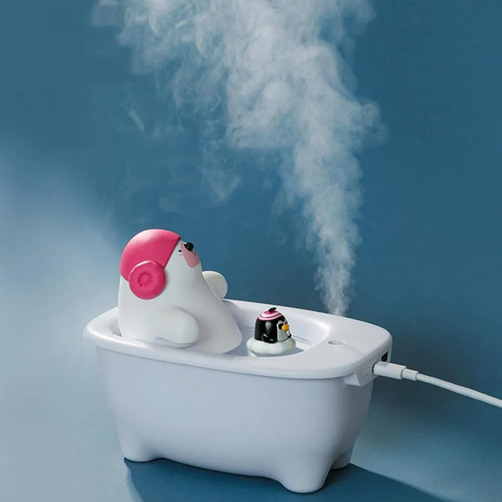 White USB air humidifier and aromatherapy scent diffuser with 550ml water tank on desk