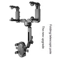 Black ABS plastic automobile rear view mirror bracket with a central folding adjustment rod.