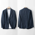Men's linen suit jacket in loose fit casual style showing solid colour design and long sleeves