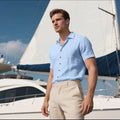 Men's loose fit linen short-sleeved shirt in cardigan style, shown in multiple solid colours.