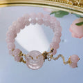 Pink crystal women's bracelet with distinctive peace buckle clasp, simple jewellery design