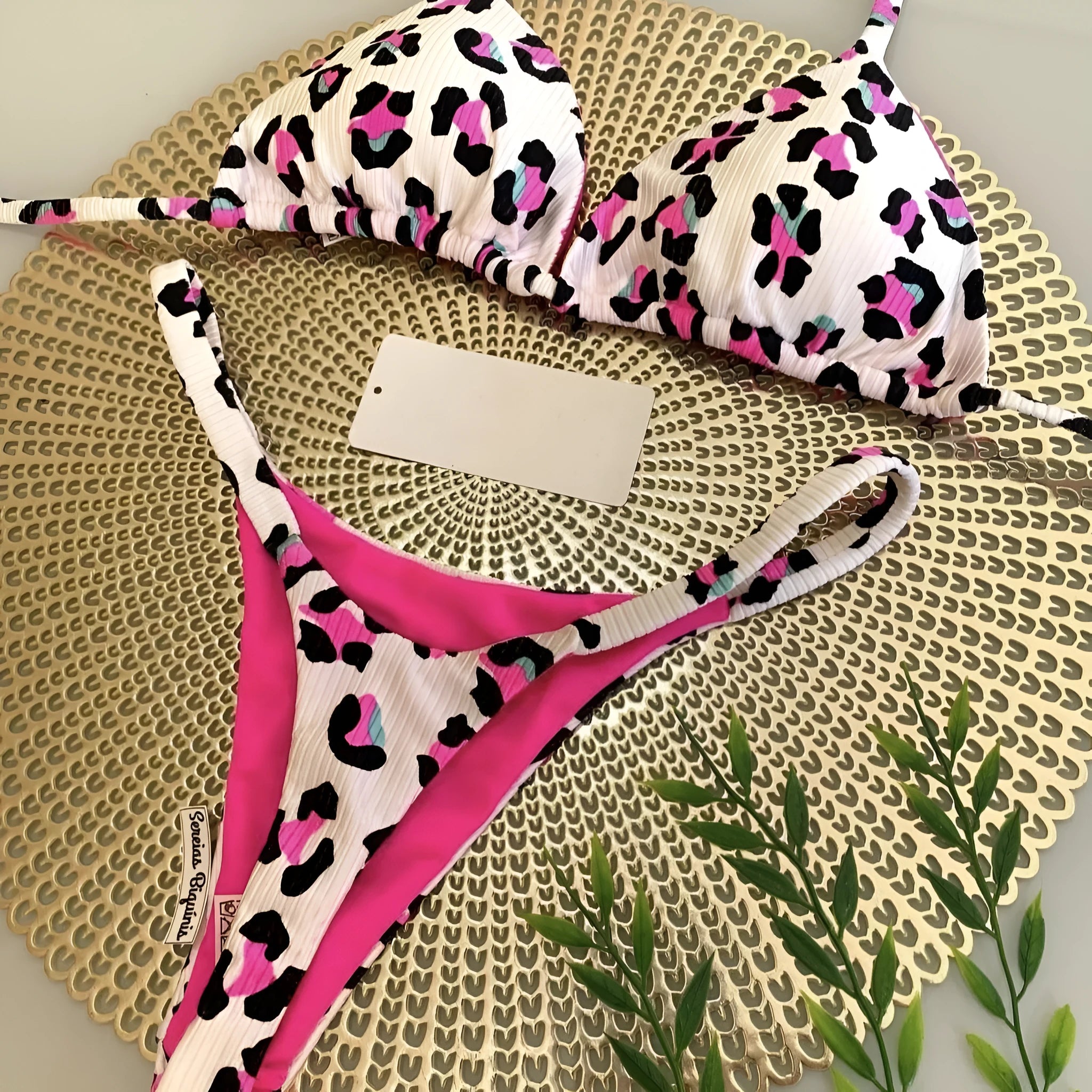 Women's printed bikini swimsuit in briefs style with cotton lining, shown in colour RT2110