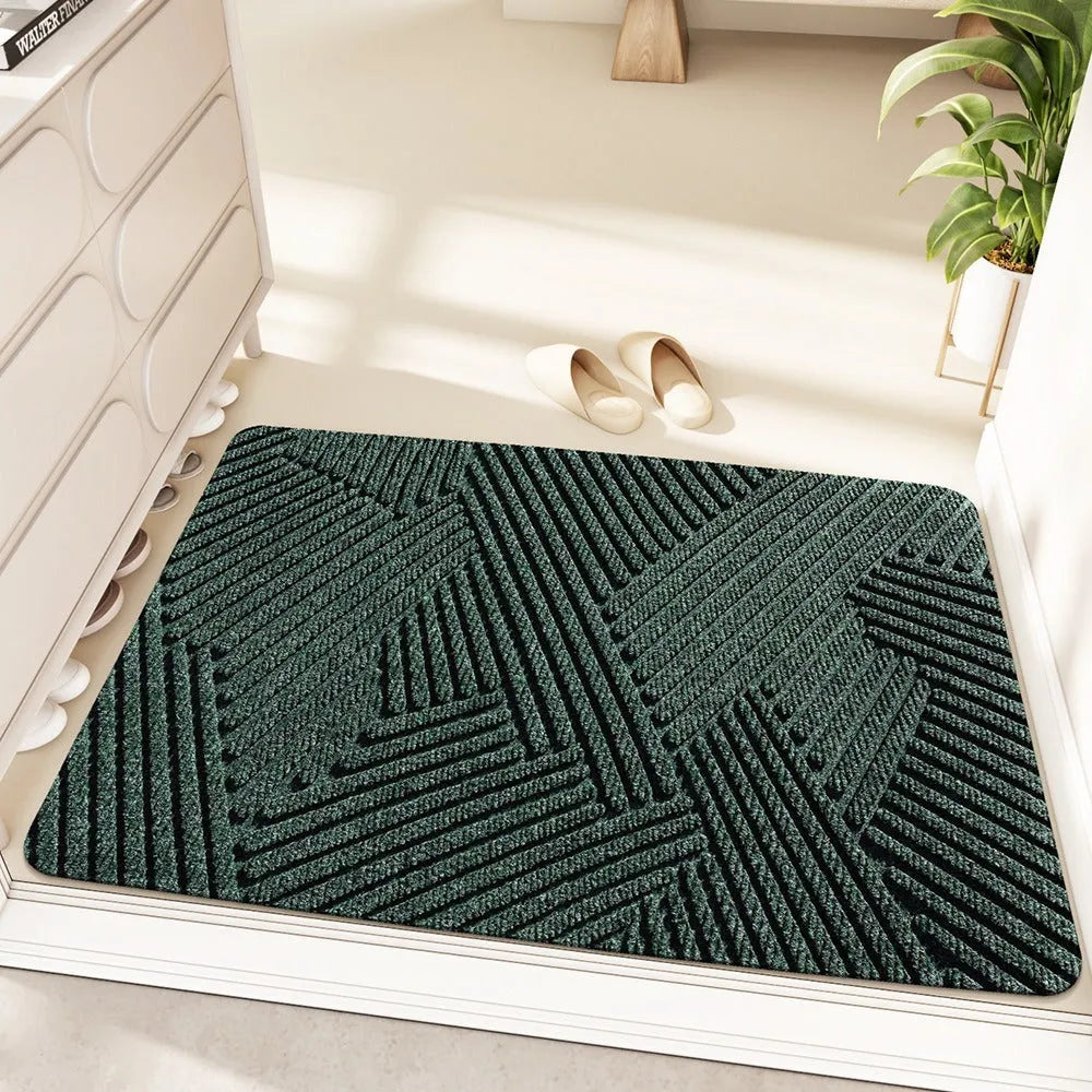 Green alien-shaped floor mat with cartoon anime pattern, dimensions 60 by 90 centimetres.