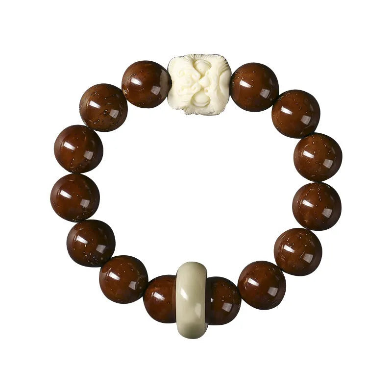 Hand-woven 13mm round bead bracelet in ivory nut lion style with single circle design