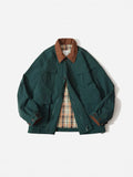 Man and woman modelling a solid green casual polyester jacket with long sleeves and side seam pockets.