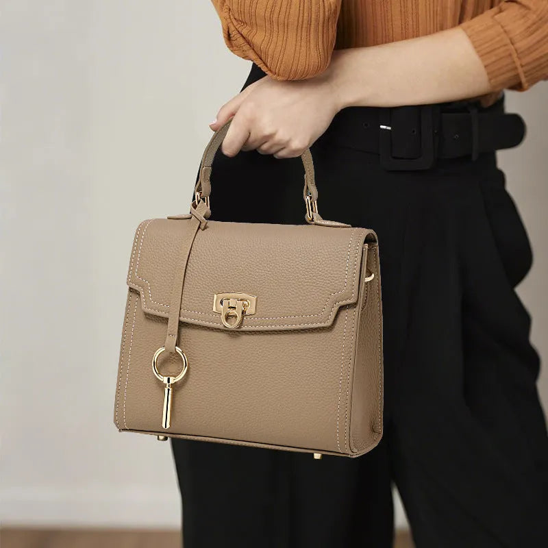 Elephant grey genuine leather handbag with vintage lock and litchi pattern texture