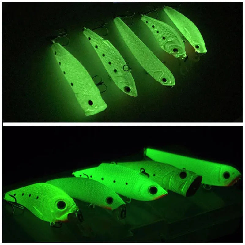 Five 3D fluorescent hard bait fishing lures with luminous details, packaged in a box.