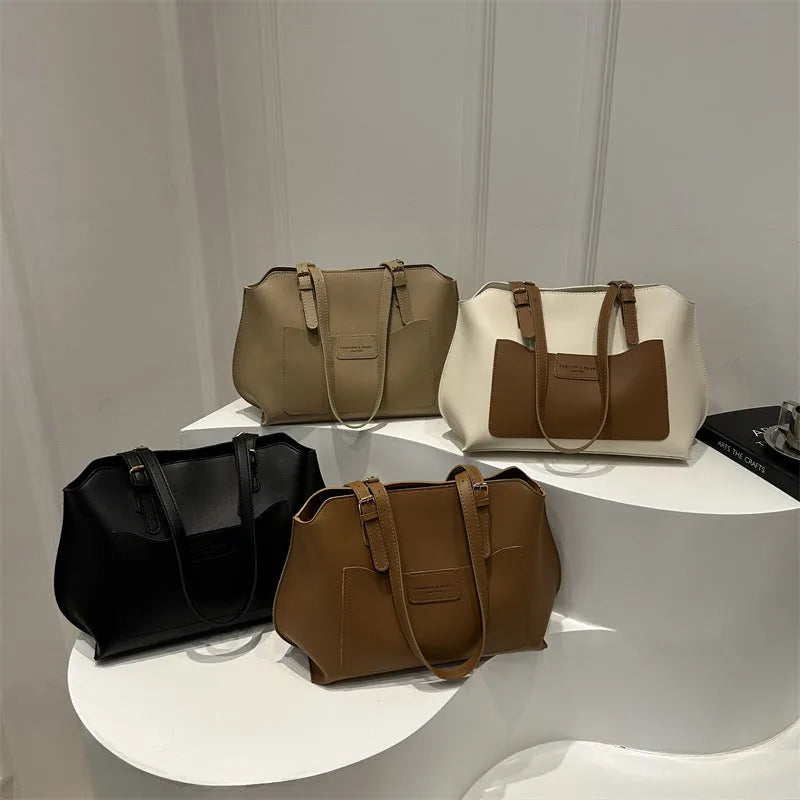 PU tote bag in horizontal square shape with double shoulder straps and visible sewing line detailing