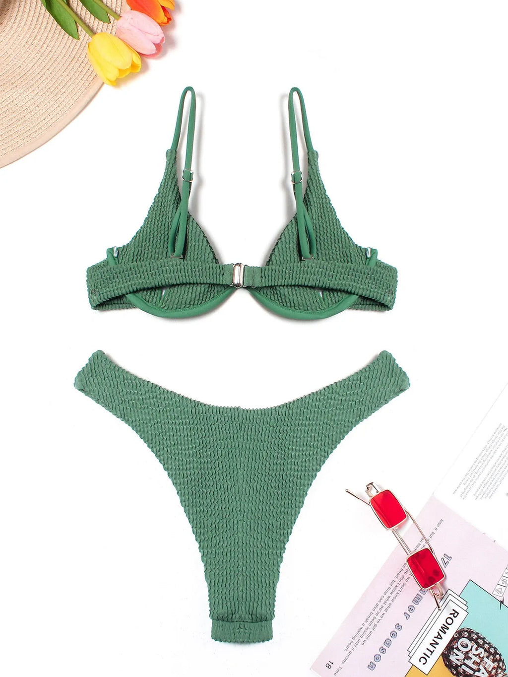 Green women's bikini swimsuit with ruffle detail and split-style briefs