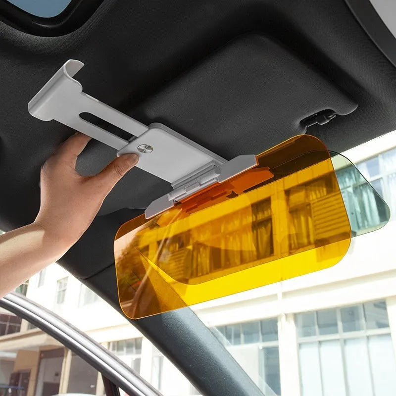 Dual-function anti-high beam goggles and car sun visor with telescopic arms for universal fitting.