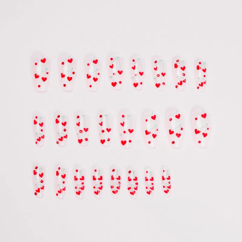 French-style red diamond and small cherry design nail art armour sheets and glue tube.