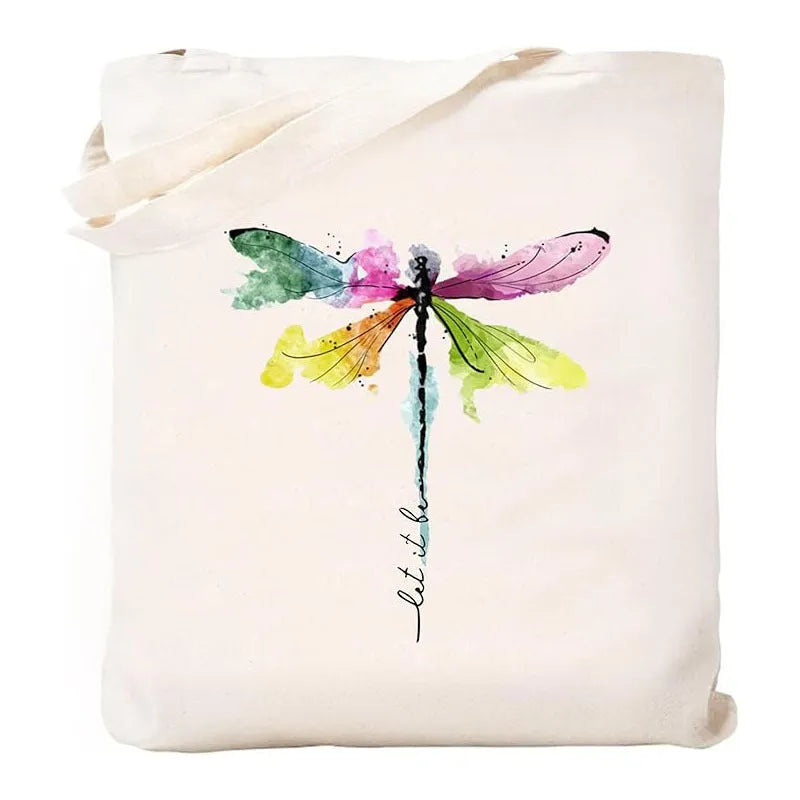 White canvas hand shopping bag with Halloween digital print, 34 by 42 centimetres, on plain background