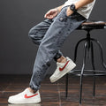 Men's loose cargo casual jeans in cotton fabric with straight leg Korean style design