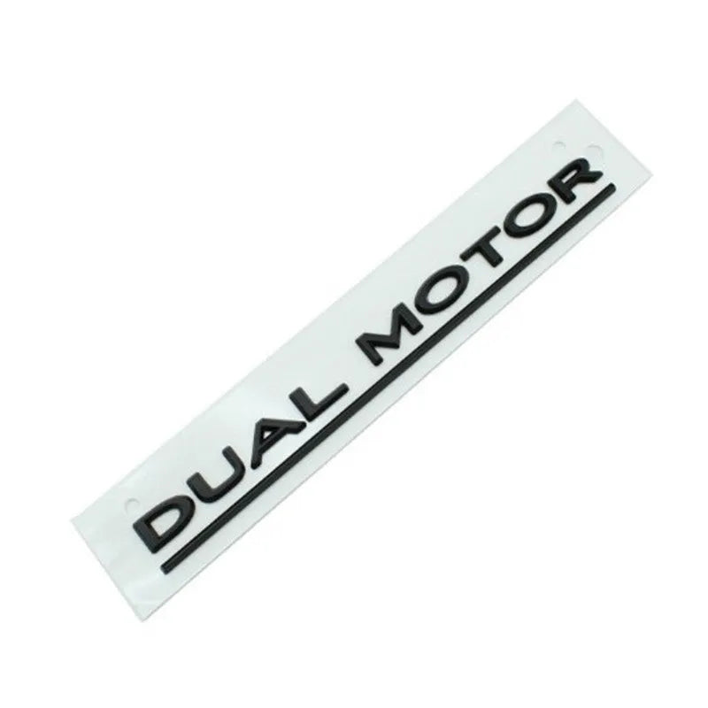Tesla Model 3 black and red ABS plastic bumper sticker measuring 19x3cm with double motor text
