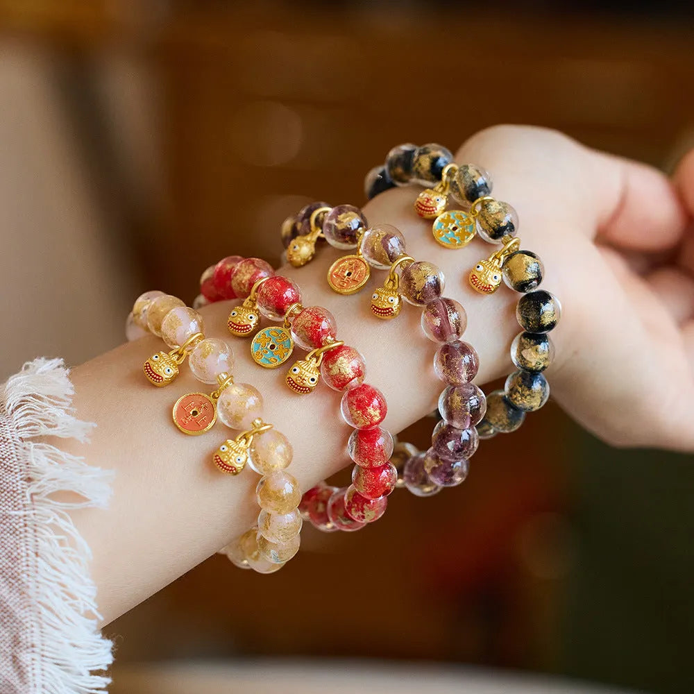Handmade national style swallow gold beast bracelet in colourful fragrant grey gold foil coloured glaze glass