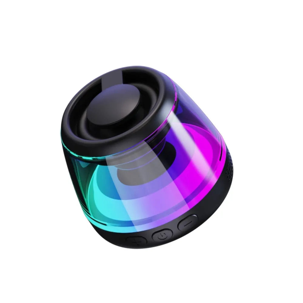 White mini Bluetooth speaker with ambient light on magnetic base