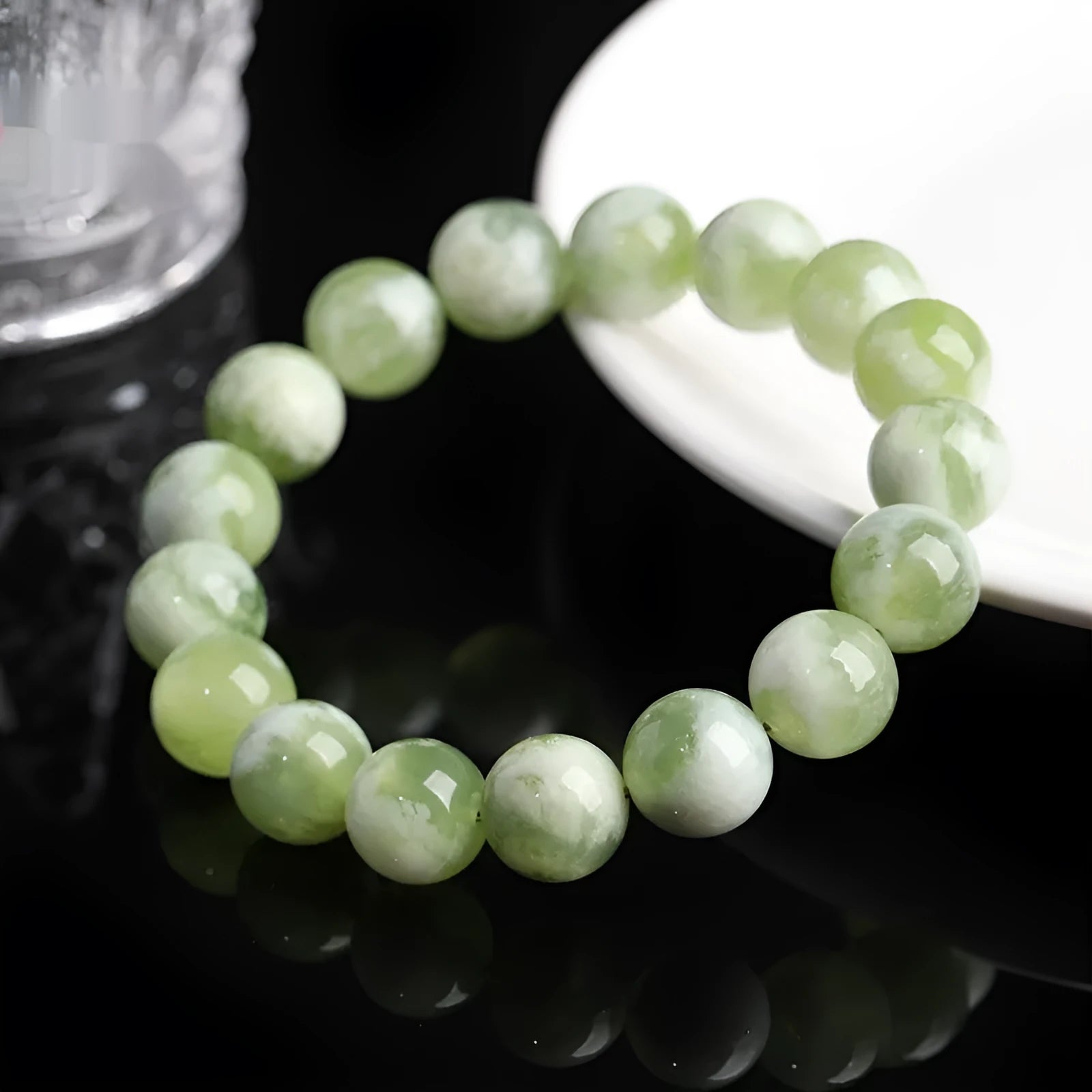 Green milk-in-water Xiuyan jade bracelet with geometric beads in single circle design