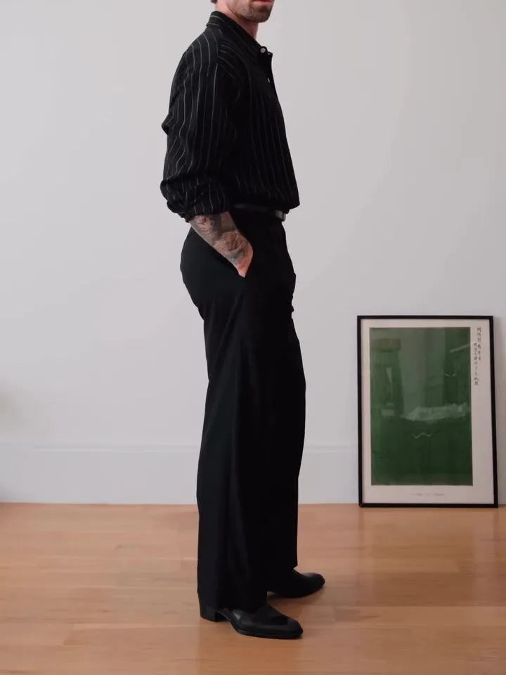 Black pinstriped button-down polyester shirt with regular fit on mannequin