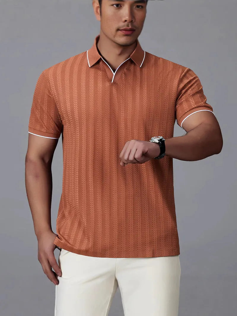 Men's loose fit short sleeve ice silk nylon polo shirt in black on a hanger