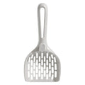 Grey plastic cat litter scoop standing upright in its attached storage base