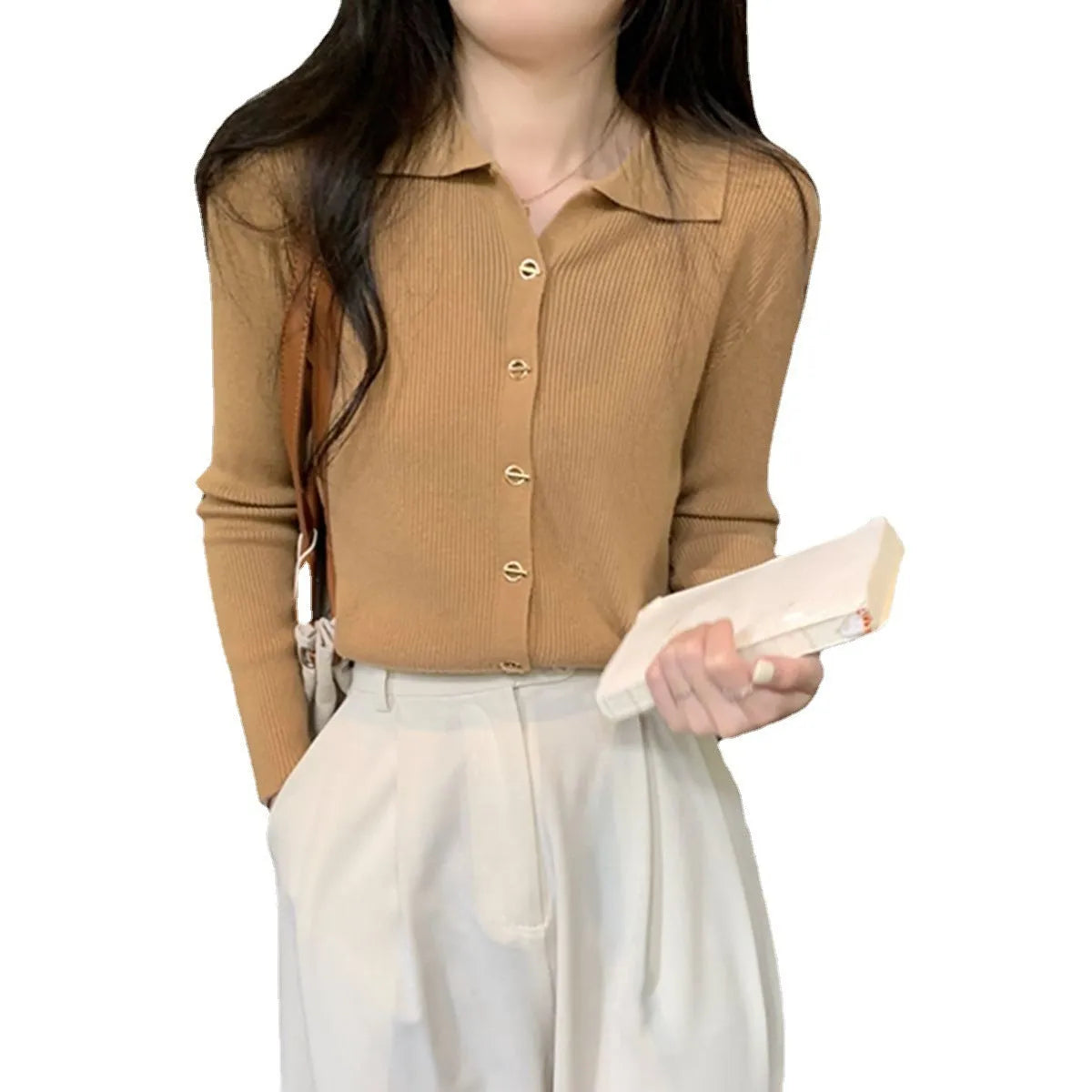 Long sleeve knitted cardigan in viscose fibre showing loose fit and available in beige, black, oatmeal, green, and khaki colours