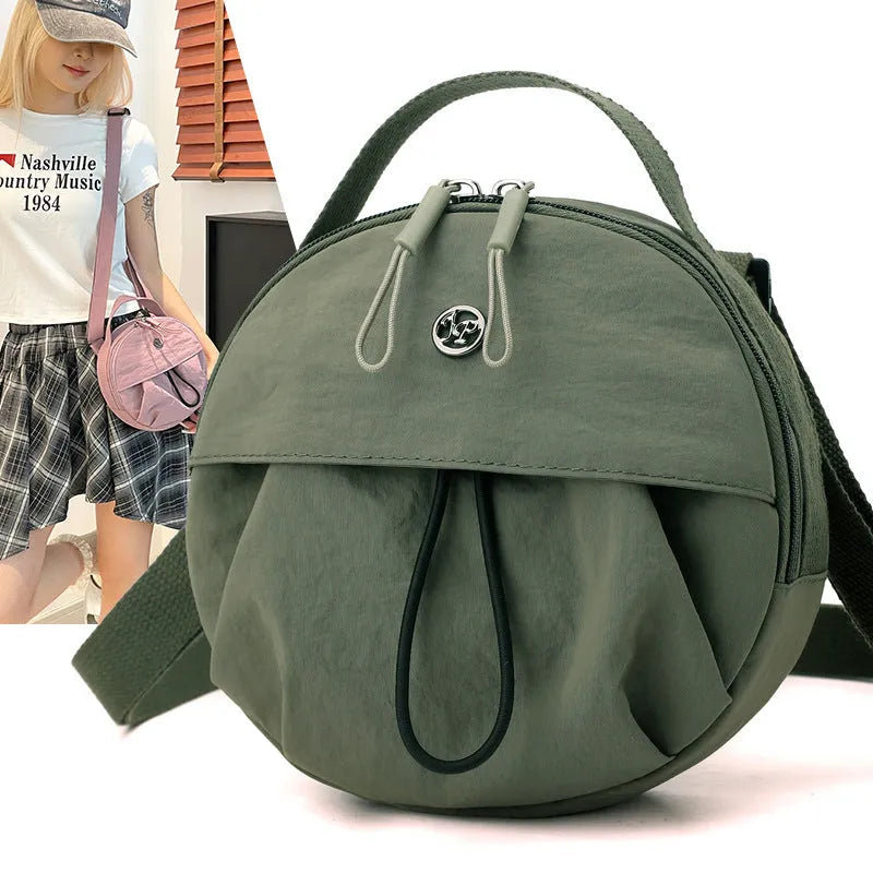 Nylon crossbody messenger bag in urban style with internal organisers, shown in a selection of colours.