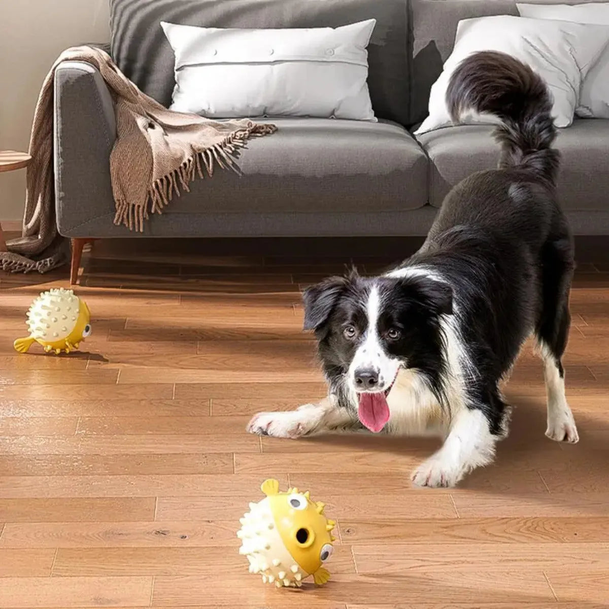 Yellow fish-shaped vinyl dog chew toy for aggressive chewers with textured surface
