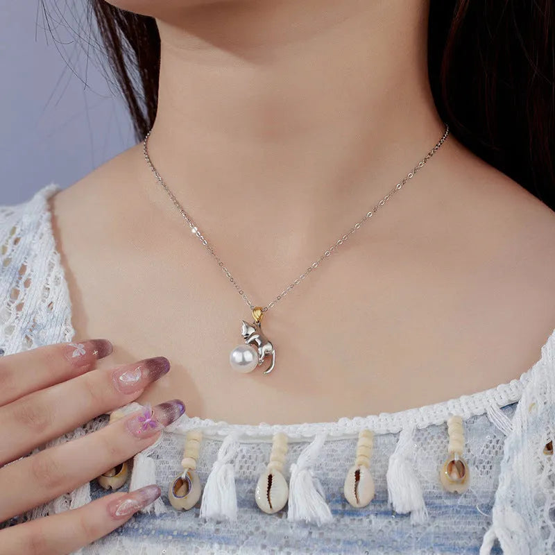 Sterling silver clavicle chain necklace with cat motif and pearl bead decoration