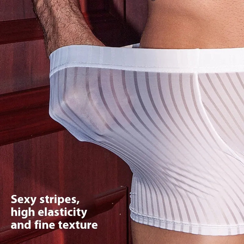 Men's black striped nylon boxer briefs laid flat, showing high-elastic fabric and design.