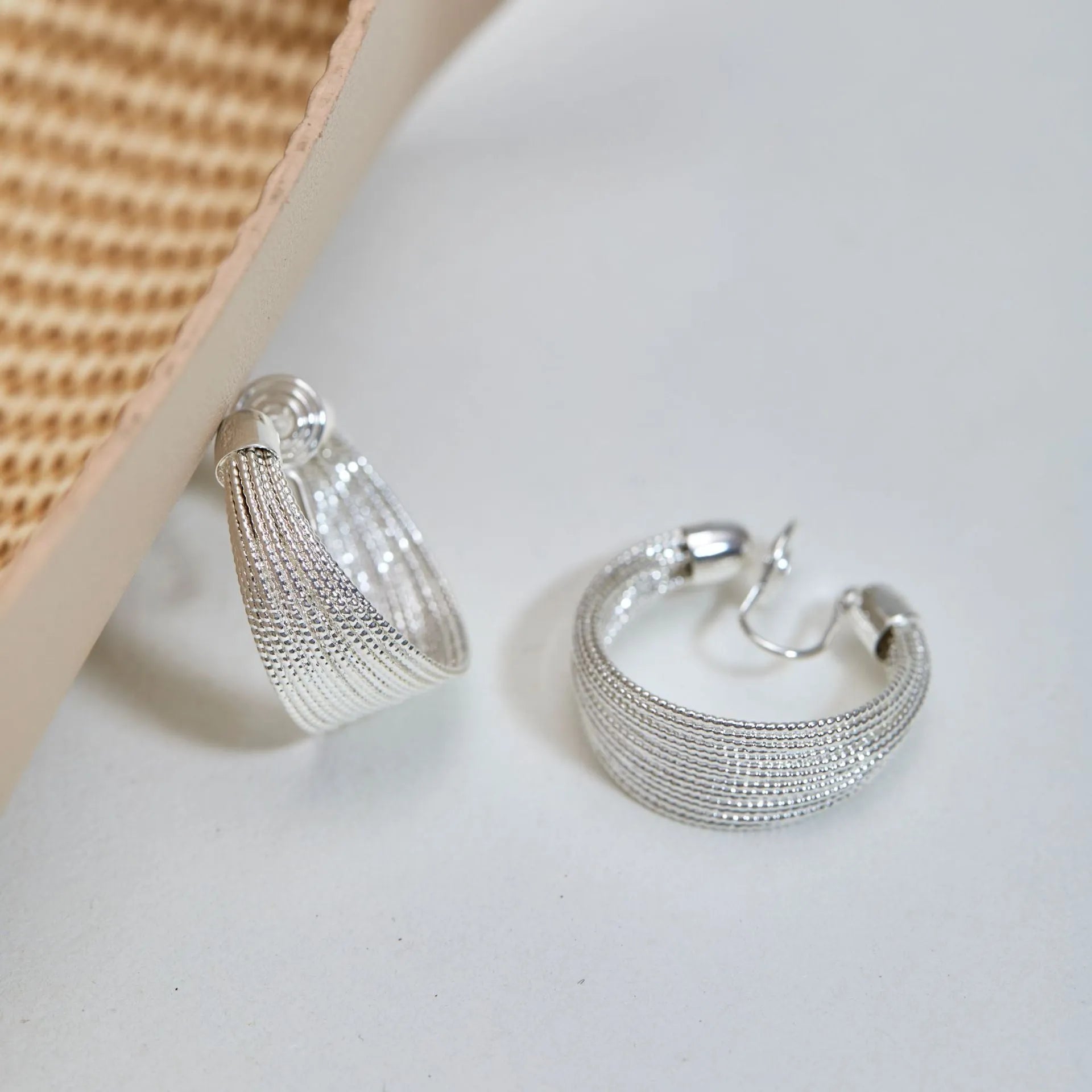 Copper geometric stud and clip earrings with silver and gold electroplated finishes