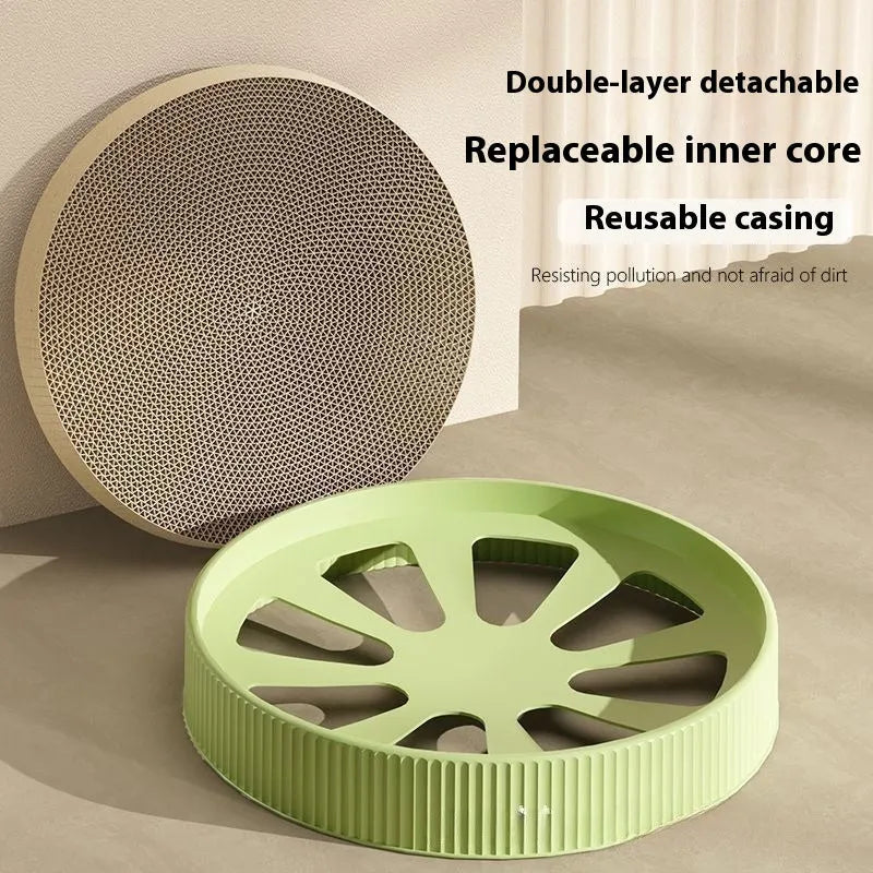 Round green and white corrugated paper cat scratching board and nest, 55cm diameter, with replacement refills.
