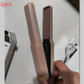 Pink cordless USB hair straightener with ceramic plates on a white background.