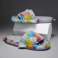 Shark-themed open toe slippers made from EVA material in beige, shown from a side view.