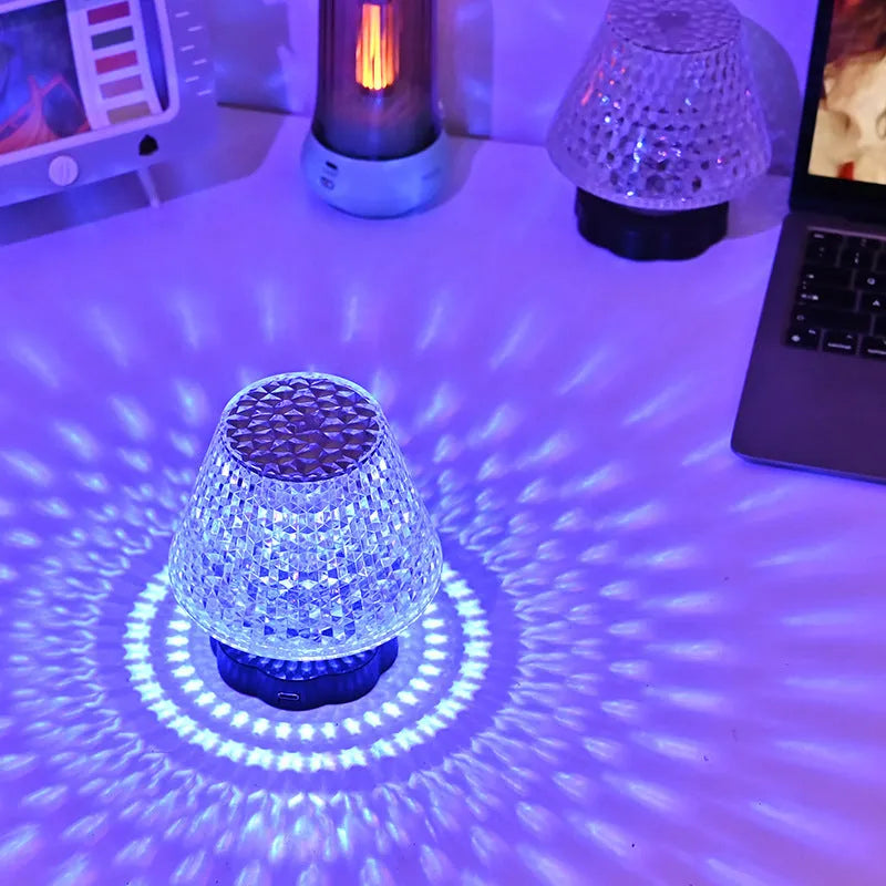 Crystal table lamp with touch base and LED lighting on wooden surface