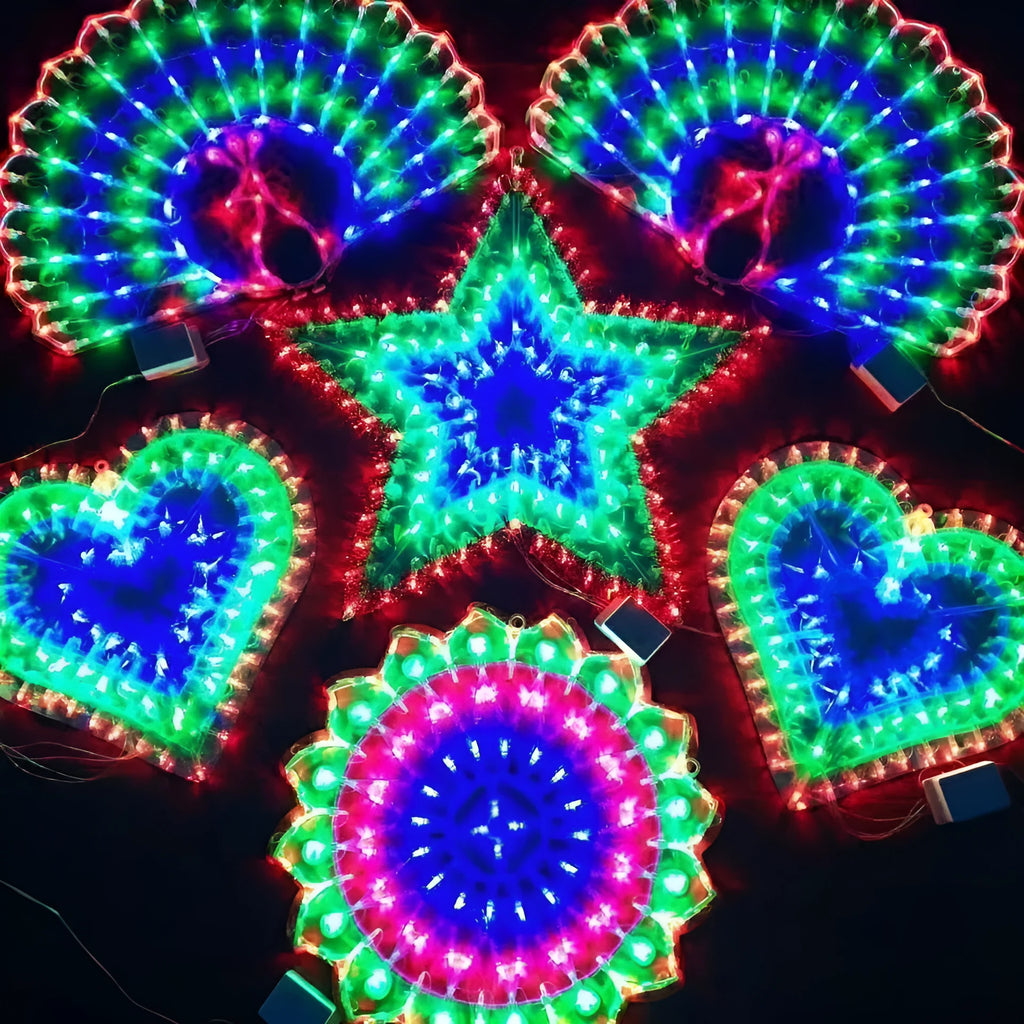 Outdoor Christmas string lights with decorative bulb shapes including peacock, heart, sunflower, and star designs