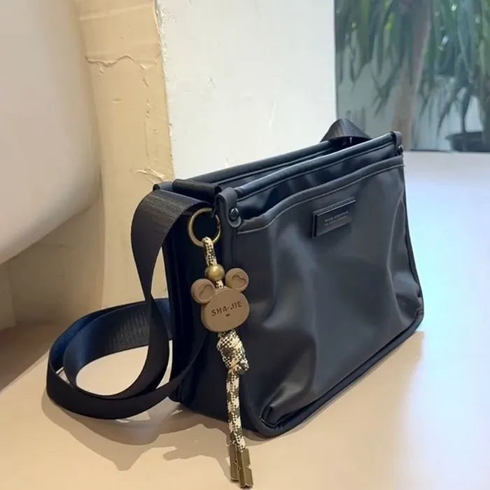 Oxford cloth retro crossbody bag with small square design and adjustable strap