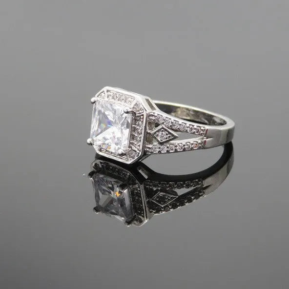Geometric hollow design zircon ring with platinum colour finish on copper band