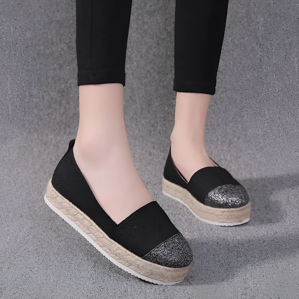Plus size canvas oversleeve shoes in black and beige colours showing round toe design