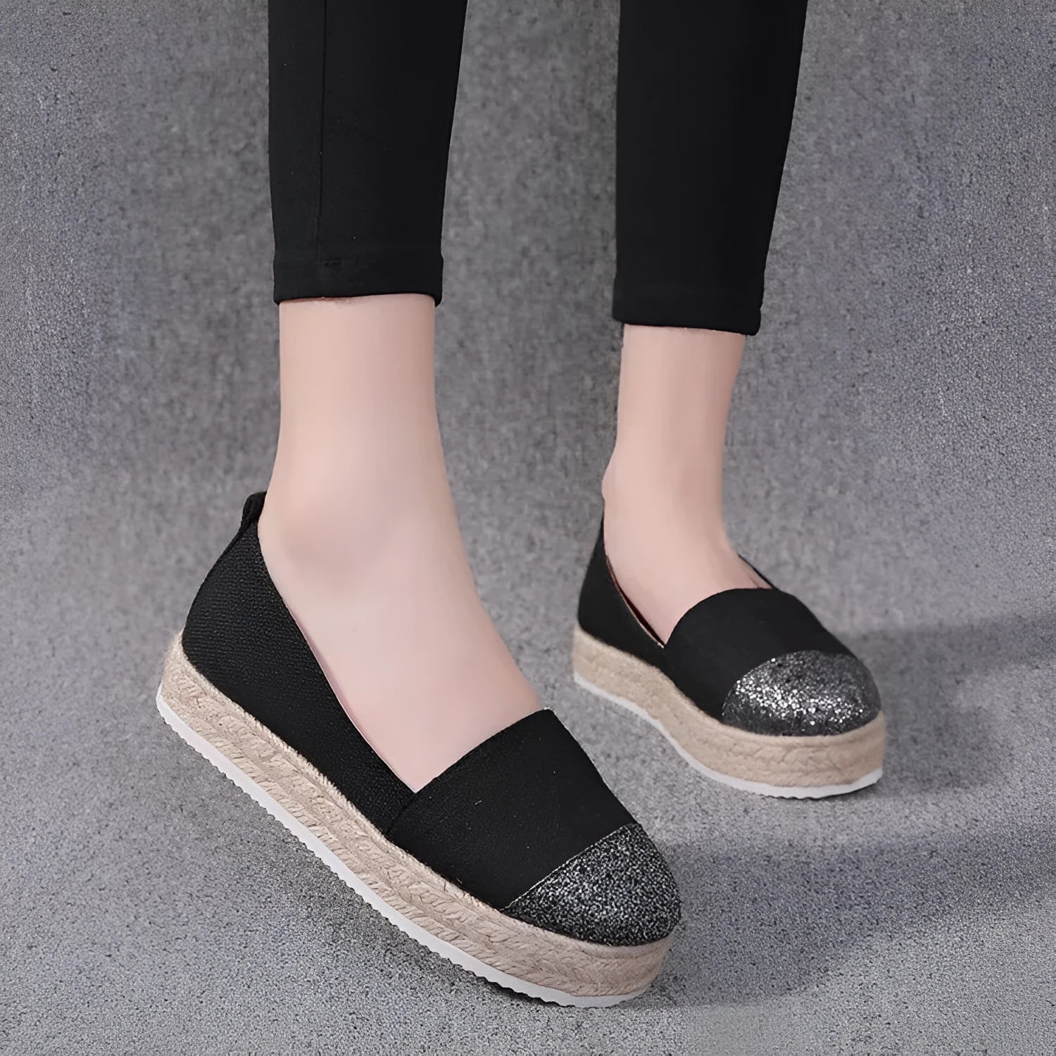 Plus size canvas oversleeve shoes in black and beige colours showing round toe design