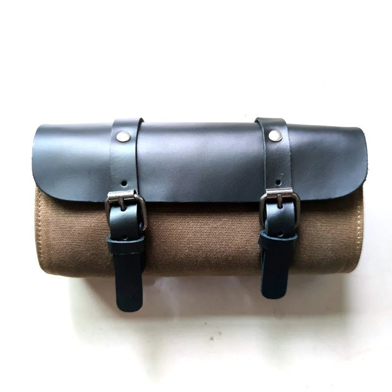 Retro style cotton motorcycle messenger bag in army green with rivet details.