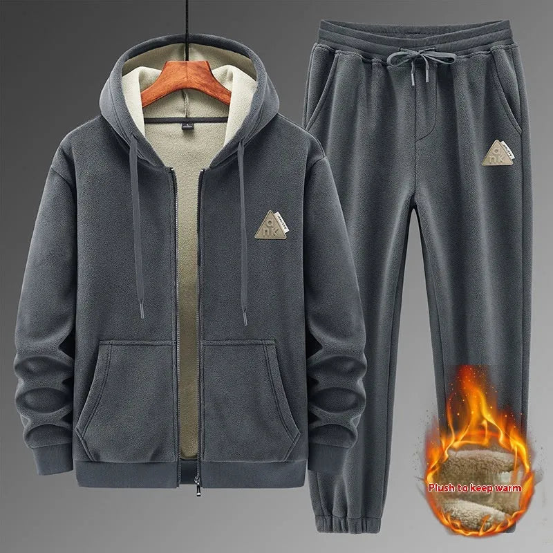 Grey cashmere hooded sweater and cotton pants two-piece sports suit laid flat.